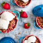 strawberry rhubarb crumble mini pies with fresh strawberries