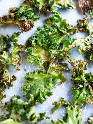 baked kale chips close up on sheet tray