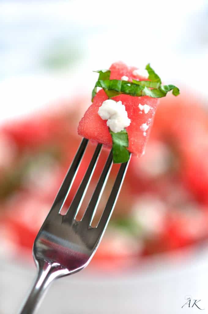 Summertime Basil Watermelon and Goat Cheese Salad with fork