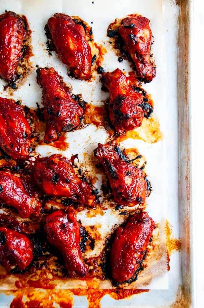 Baked Honey BBQ Chicken Wings sheet pan with sauce