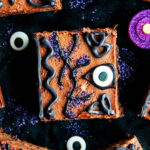 Winifred's Spell Book Hocus Pocus Brownies on black fabric with glittery candles