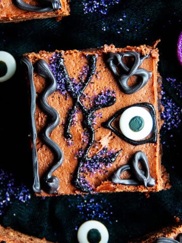 Winifred's Spell Book Hocus Pocus Brownies on black fabric with glittery candles