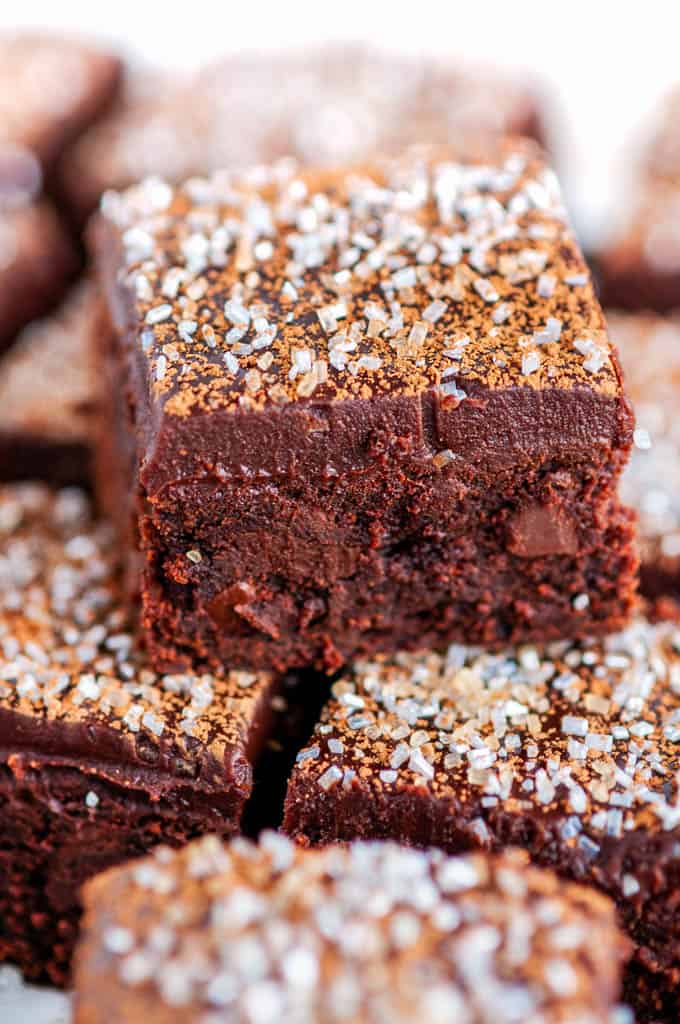 Baileys Irish Cream Brownies with Chocolate Ganache topped with cocoa powder and silver sprinkles