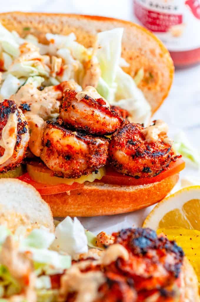 Blackened Shrimp Po Boys with Remoulade Sauce on parchment paper