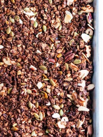 Chocolate Ancient Grains Nut Granola on sheet pan