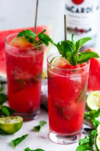 Fresh Watermelon Mojito with mint and lime on white marble