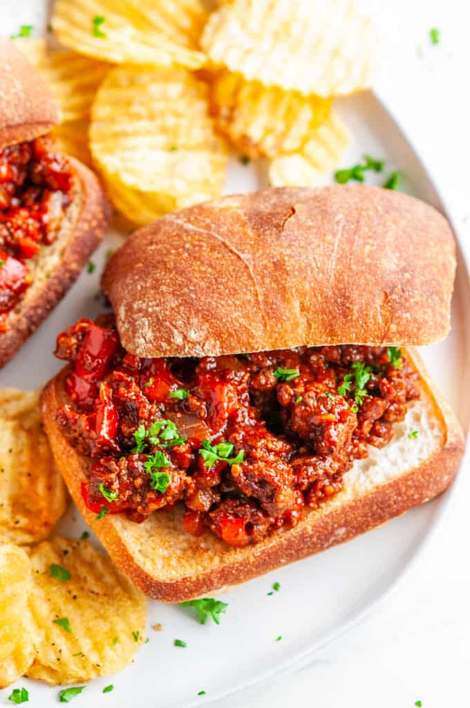 Best Ever Sloppy Joes with chips on white plate close up