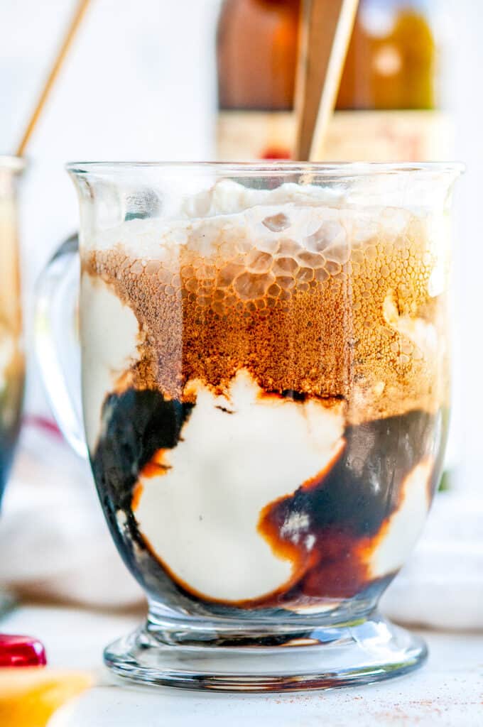 Stout Float with No-Churn Vanilla Ice Cream in glass mug with gold spoon and bottle