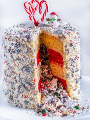 Christmas Explosion Cake with Peppermint Buttercream Frosting sliced