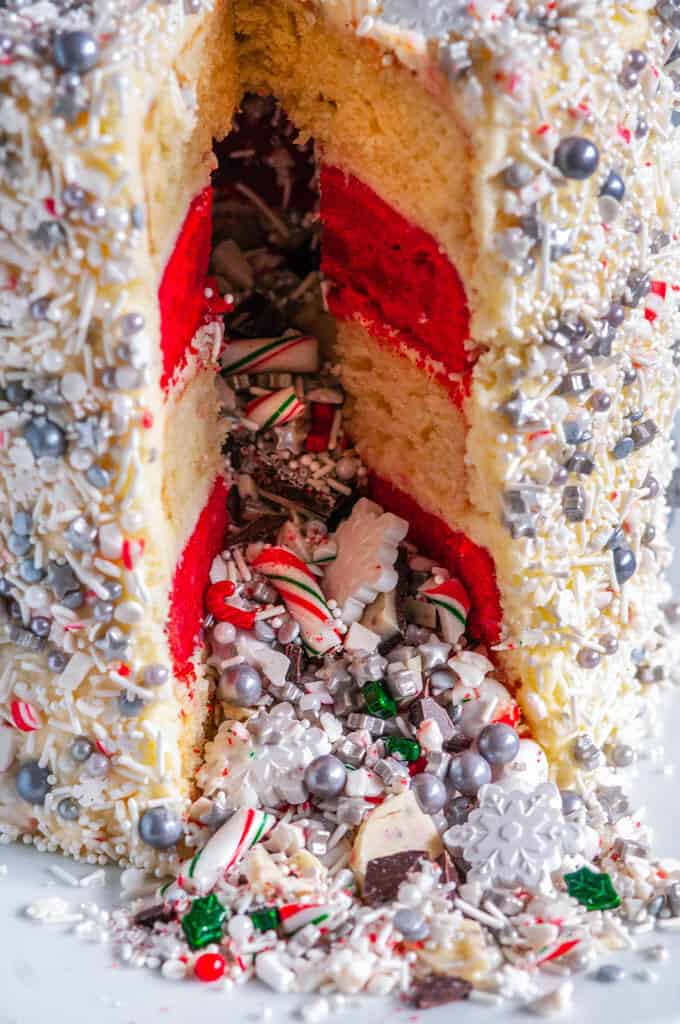 Christmas Explosion Cake with Peppermint Buttercream Frosting sliced close up