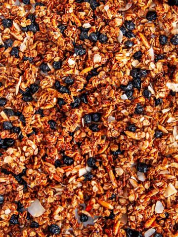 Blueberry Almond Coconut Granola on sheet pan overhead view