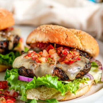 Chicken Chipotle Burgers with pepper jack cheese and pico de gallo close up