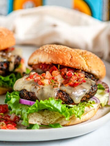 Chicken Chipotle Burgers with pepper jack cheese and pico de gallo close up