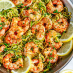Skillet Shrimp Zucchini Noodles with lemon in silver all clad skillet over head