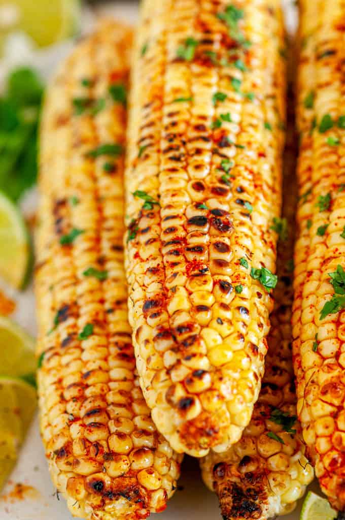 Grilled Chili Lime Honey Butter Corn on the Cob side view close up