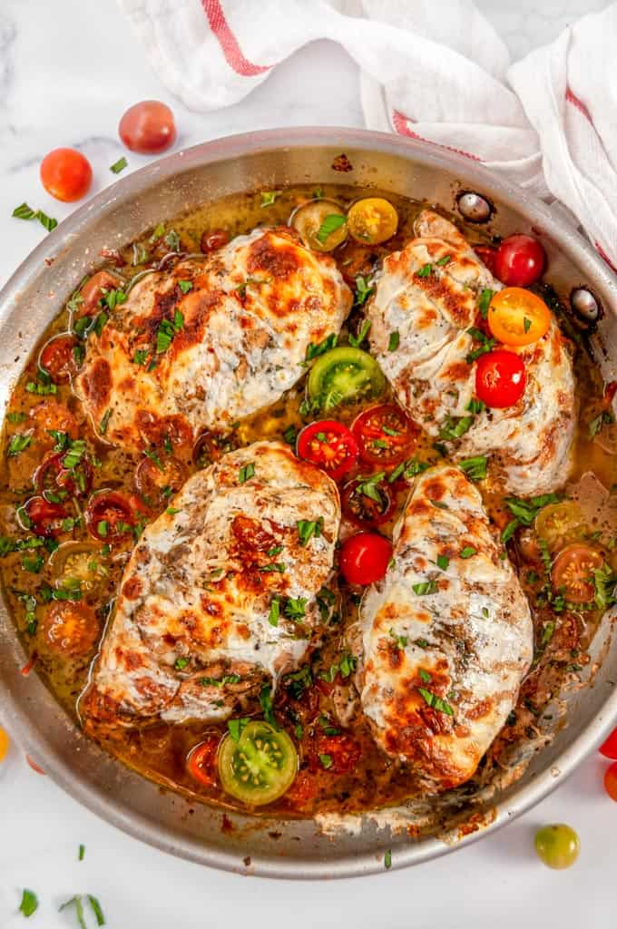 Quick & Easy Skillet Chicken Caprese with cherry tomatoes and pan sauce in All-Clad Skillet