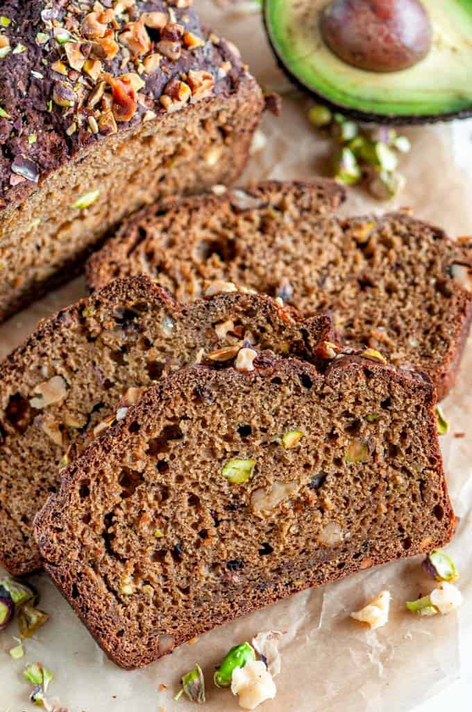 Nutty Banana Avocado Bread sliced on brown parchment paper