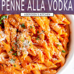 Easy Penne alla Vodka in white bowl with gold spoon close up with purple rectangle and white text overlay