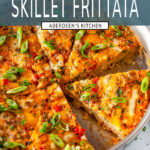 Skillet Potato Spinach Frittata in all-clad high sided skillet sliced with green onion and fresh dill on white marble close up - teal rectangle with white text overlay