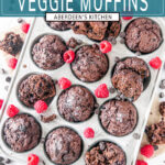 Chocolate Raspberry Veggie Muffins in silver muffin tray on white marble with chocolate chips overhead view - teal rectangle overlay with white text