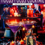 Halloween Hocus Pocus Cocktail in sugar rimmed martini glasses with potions in background - purple rectangle with white text overlay