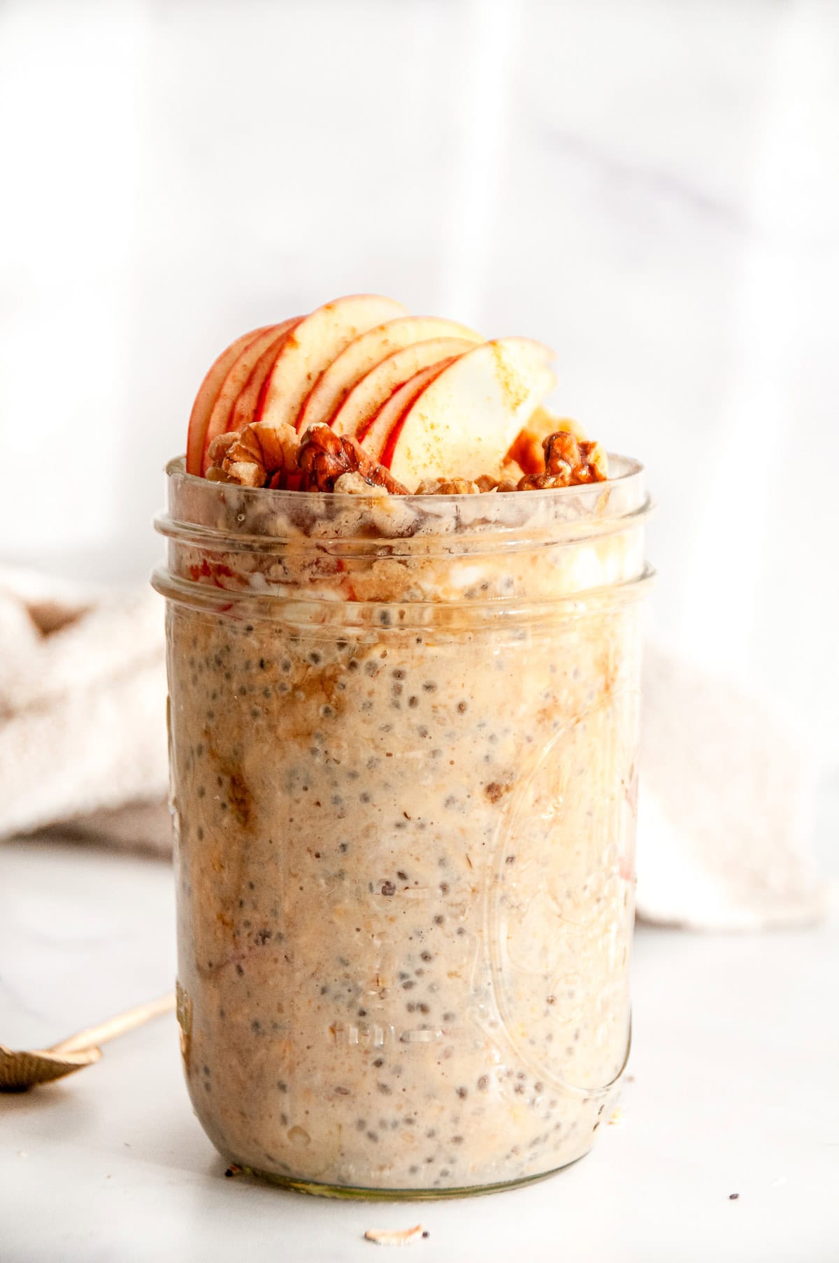Apple cinnamon overnight oats with fresh apple slices