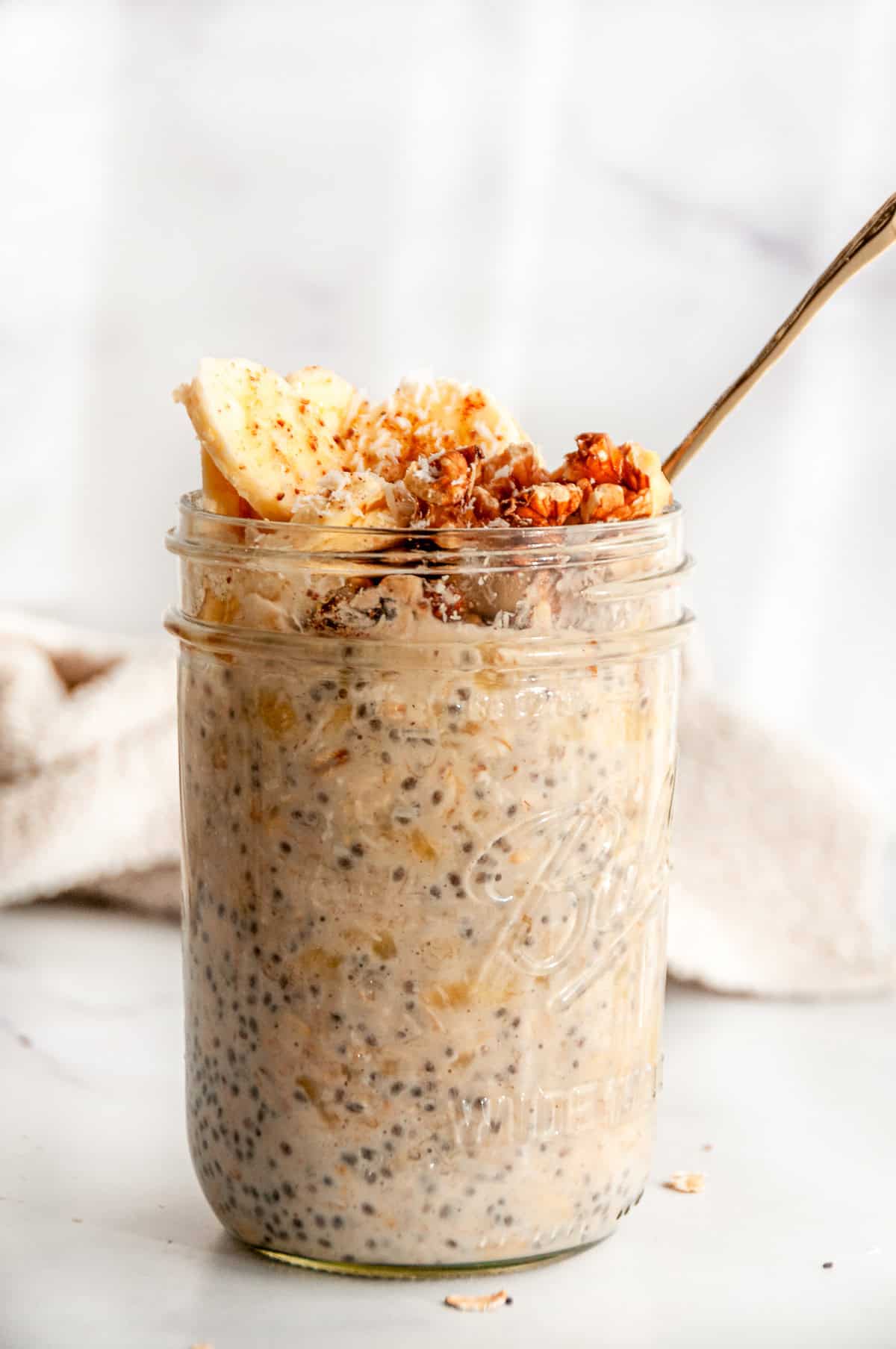 Banana overnight oats with walnuts and cinnamon