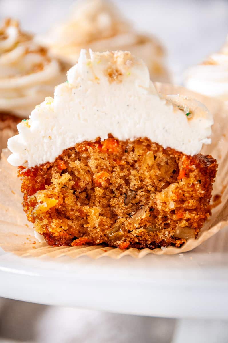 Detailed view of Carrot Cake Cupcake crumb with raisins, walnuts, and carrots inside